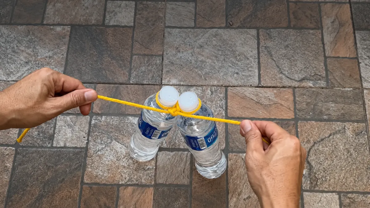 Carrying Two Bottles at Once with a Rope