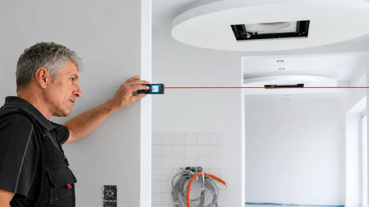 How Can a Handheld Device Measure Distances So Accurately?