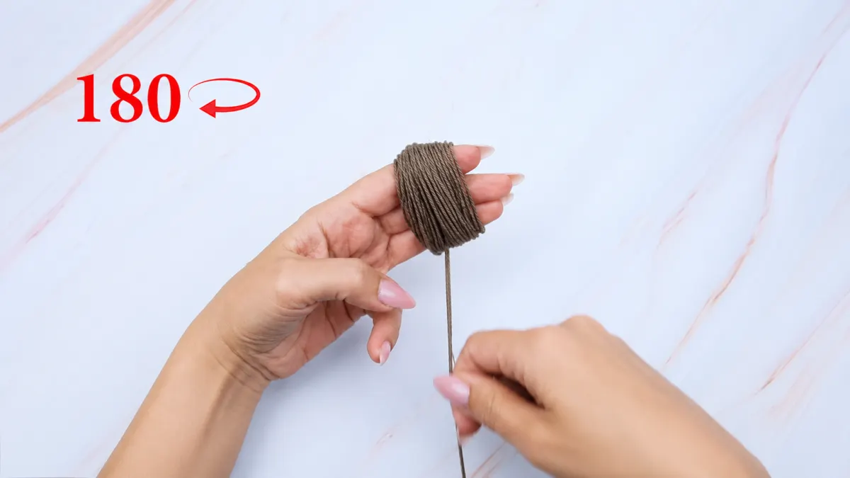 Step 2: Wrap the Yarn Around Your Fingers
