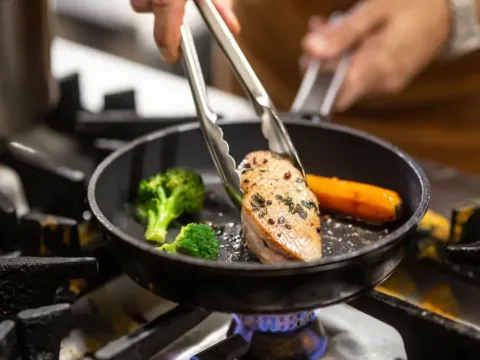 13 Nonstick Pans Under $100 That Let You Cook with Little to No Oil